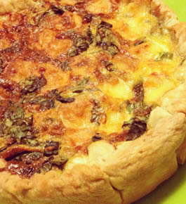 Quiche à la courgette, aux poireaux et aux lardons